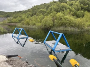 Audex pump pontoon dewatering a lagoon at British Steel Scunthorpe site